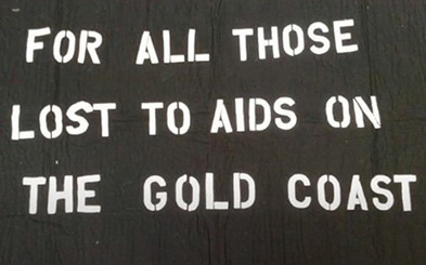 Black and white quilt panel with the words: "For All Those Lost to AIDS on the Gold Coast"